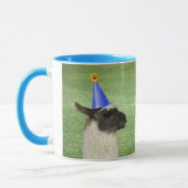 Lama drôle dans la tasse de casquette de partie (Gauche)