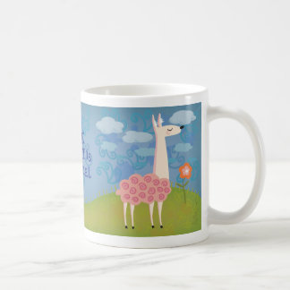 Lama rose sur la tasse de sommet