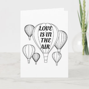 **L'AMOUR** EST DANS L'AIR **SUR NOTRE CARTE D'ANN