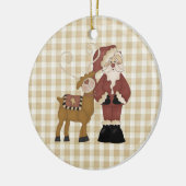 Land Santa en zijn rendierkeramisch Ornament (Links)