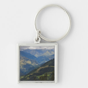 Landbouwgrond en dorp in de Himalaya Sleutelhanger