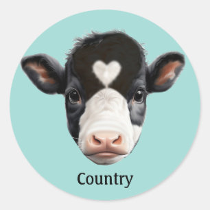Landelijk zwart-wit koeiengezicht op lichtblauw ronde sticker