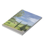 Landenstreep tussen cyperbomen in notitieblok (Gedraaid)