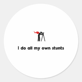 Landmeetkundige held ronde sticker