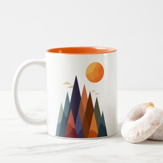 Landschap met bergen en zon tweekleurige koffiemok (Met donut)