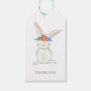 Lapin blanc adorable avec des étiquettes de cadea