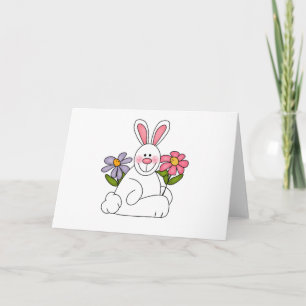 Lapin blanc avec des cartes de fleurs