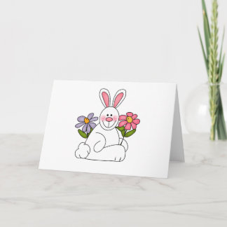 Lapin blanc avec des cartes de fleurs