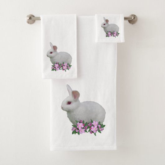 Lapin blanc et fleurs de pommier sur fond blanc (En situation)