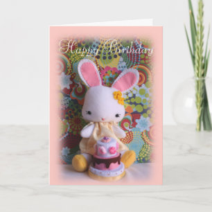 Lapin coloré de bébé avec la carte d'anniversaire