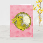 Lapin dans la carte de voeux de lune (rose et (Fleur jaune)