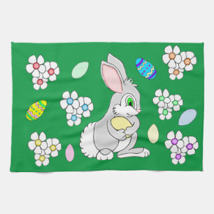 Lapin de Pâques avec oeufs et serviette de cuisine