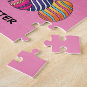 lapin de Pâques en panier avec puzzle d'oeufs. (Côté)