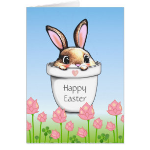 Lapin de Pâques mignon dans un pot de plante et fl
