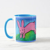 Lapin rose avec la tasse bleue de poignée (Gauche)