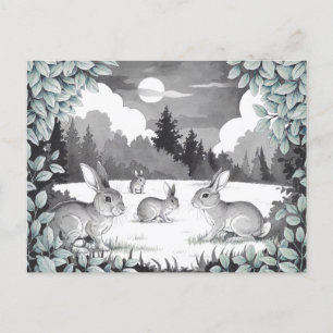 Lapins dans la carte postale de défrichage