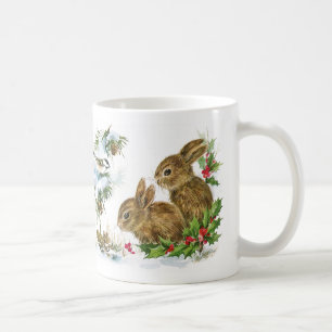 Lapins et oiseaux d'hiver dans la tasse de Noël d