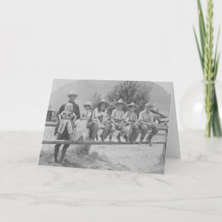 Larry Larom met zes kinderen op een omheining Kaart