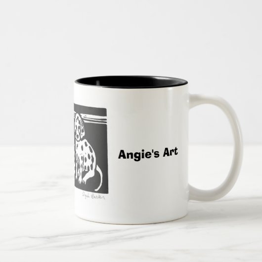 L'art d'Angie "voyant repère" la tasse (Droit)