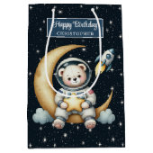 L'astronaute porte un sac cadeau pour la fête d'an (Devant)