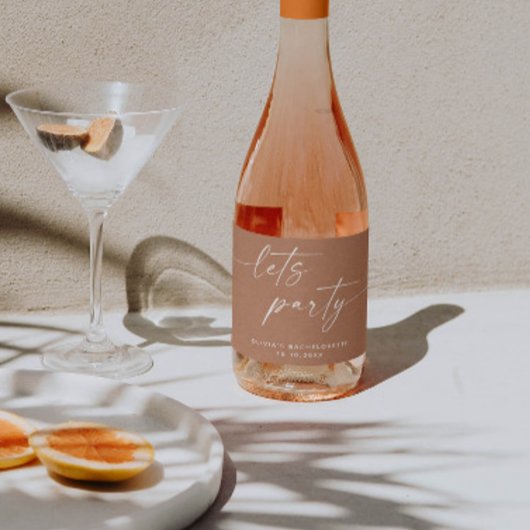 Laten we feesten. Bleek roze modern script bachelo Sparkling Wijnetiket