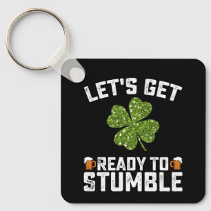 Laten we ons klaar maken om te struikelen Funny St Sleutelhanger