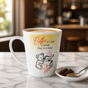 Latte Le café est un câlin chaud dans une tasse