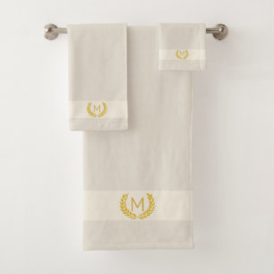 Laurier doré et monogramme sur beige clair sableux
