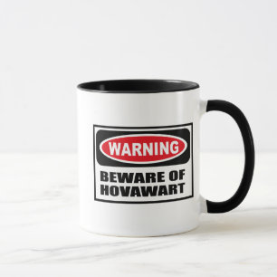 L'avertissement PRENNENT GARDE de la tasse de
