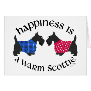 Le bonheur des Terriers écossais noirs