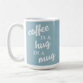 Le café est un câlin dans une Mug Muted Blue Mug (Gauche)