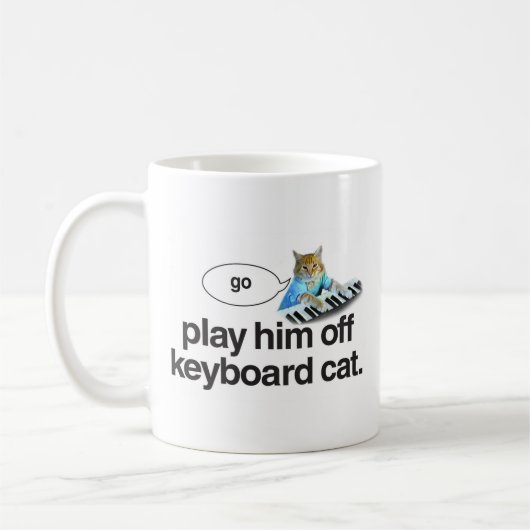 le chat de clavier vont tasse (Gauche)