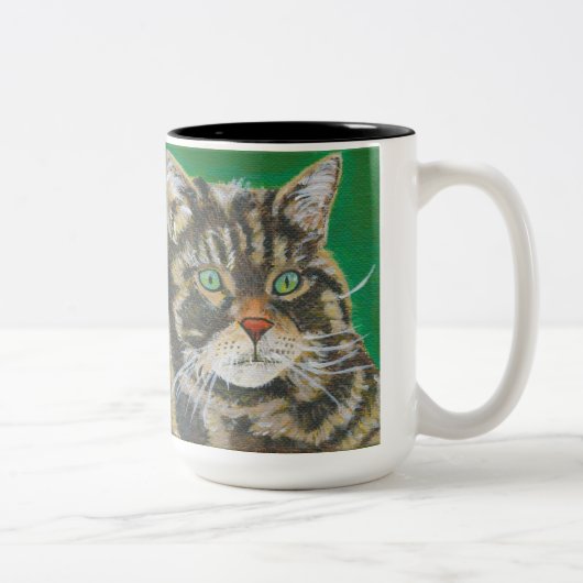 Le chat tigré, la tasse mignonne deux de Kitty a (Droit)