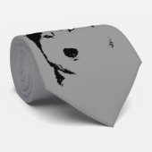 Le chien de traîneau sibérien attache les cravates (Roulé)