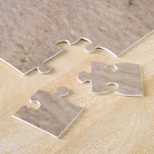 Le coeur dans le puzzle du sable (Côté)