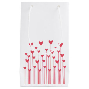 Le coeur fleurit le sac de cadeau - rouge