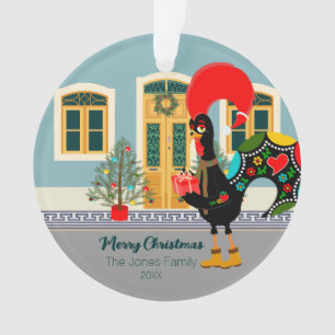 Le coq portugais avec un cadeau de Noël