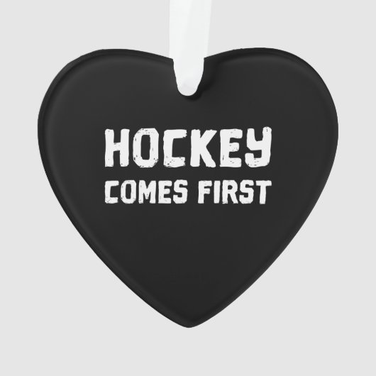 Le hockey arrive en premier (dos)