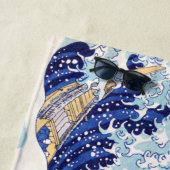 Le Japonais ondule la serviette de plage (En situation)