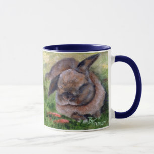 Le lapin rêve la tasse