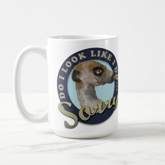 Le Meerkat avec la tasse d'attitude (Gauche)