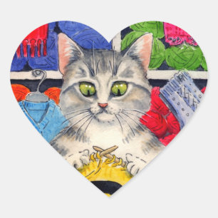 Le mignon chat adore tricoter des autocollants