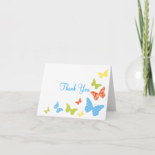 Le papillon embrasse le Merci