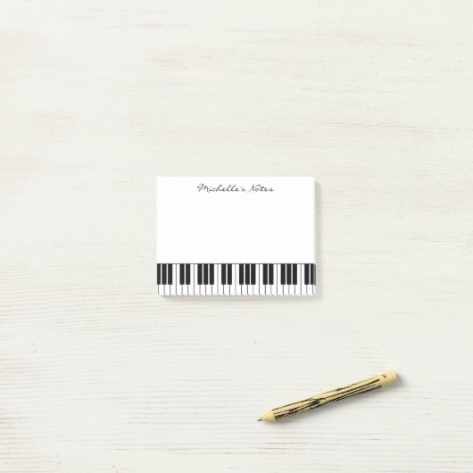 Le piano à queue verrouille des notes de post-it (Sur un bureau)