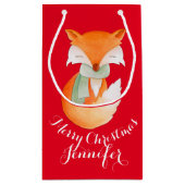 Le renard mignon a enveloppé le sac de cadeau de (Dos)