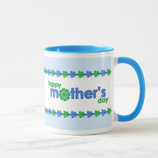 Le ressort bleu du jour de mère fleurit la tasse