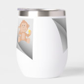 le singe mange de la banane sous le patch (Droite)