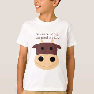 Le T-shirt de l'enfant brun mignon de vache