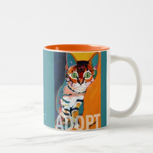 Le tigre ADOPTENT la tasse par des brûlures de Ron (Droit)