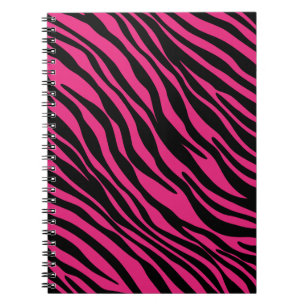 Le zèbre rose et noir barre le carnet de notes à